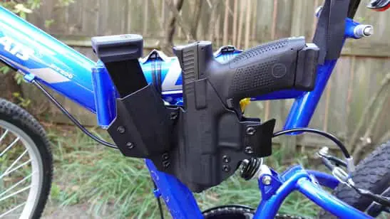 T.Rex Arms Sidecar holster and cz p10c mounted on a bicycle.