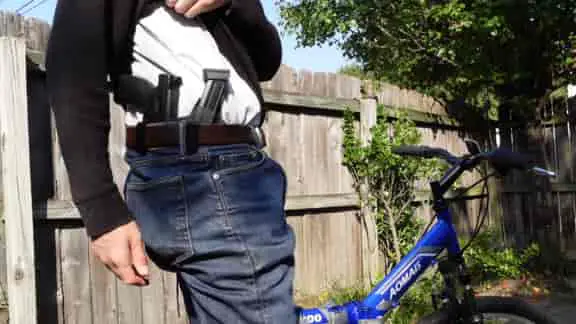 T.Rex arms sidecar holster at strong side inside the waistband on a bicycle